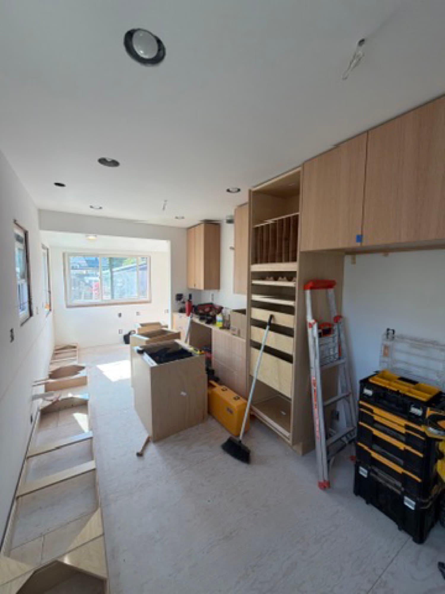 Custom kitchen cabinets during installation