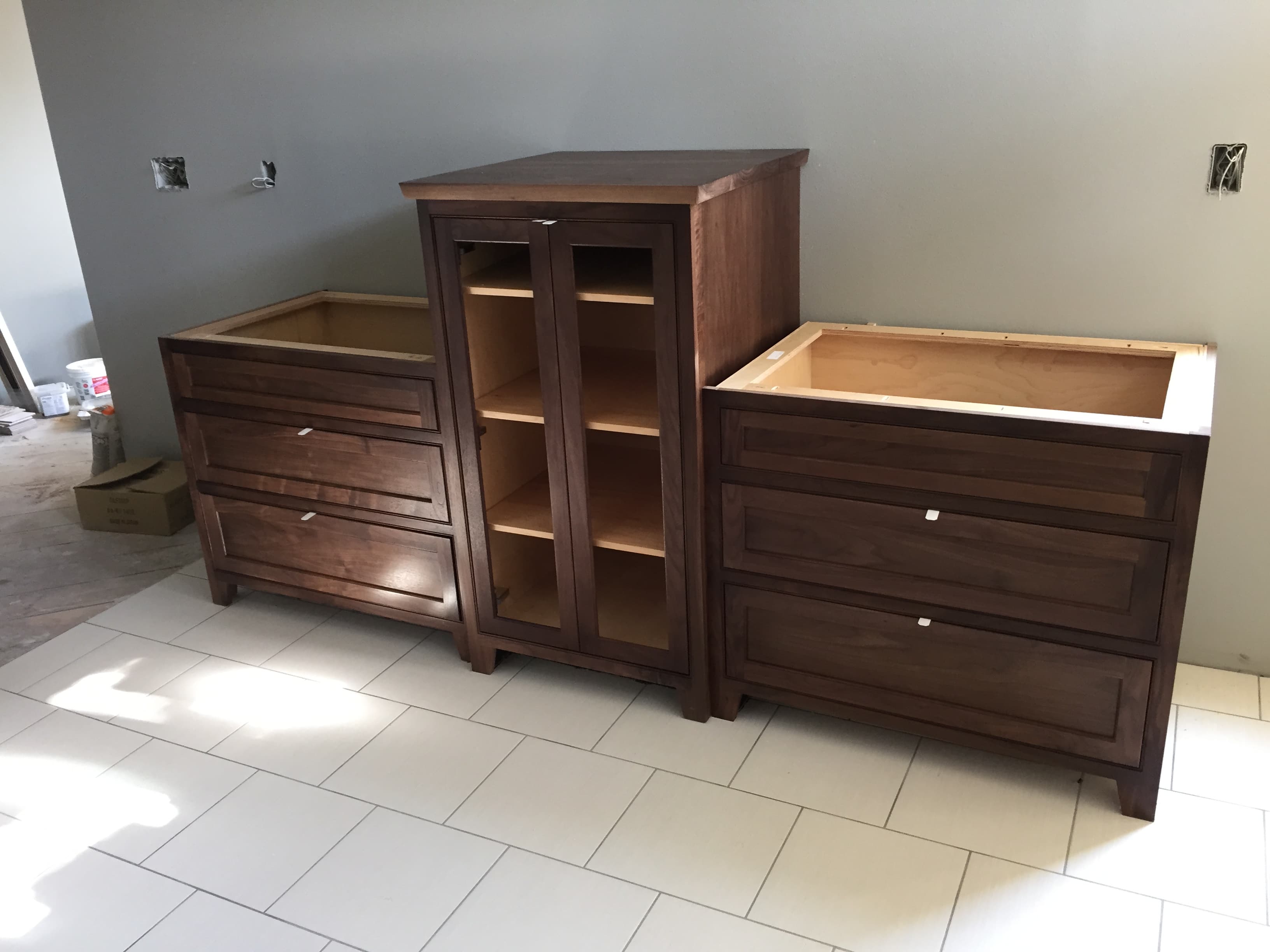 Walnut vanity collection with inset cabinet fronts